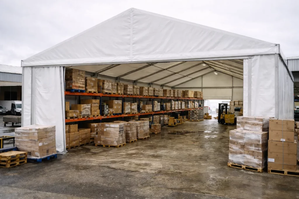 Temporary warehouse in use Temporary warehouse after flood