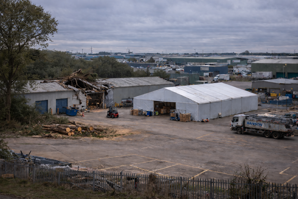 Temporary warehouse in use after storm damage A temporary warehouse on an industrial estate next to a storm damaged industrial unit